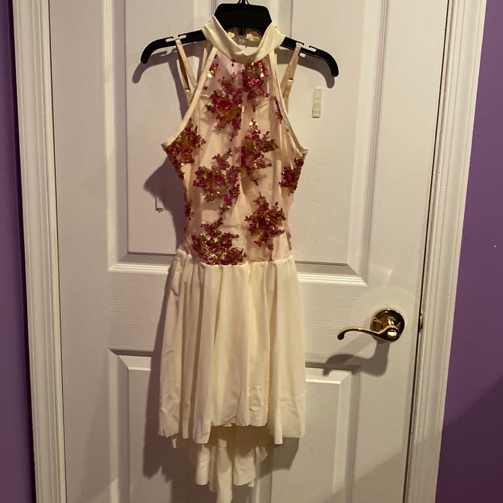 Dance costume in ivory with pink sequins